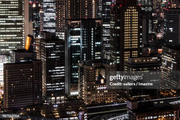 city view of osaka, japan at night - umeda sky building foto e immagini stock