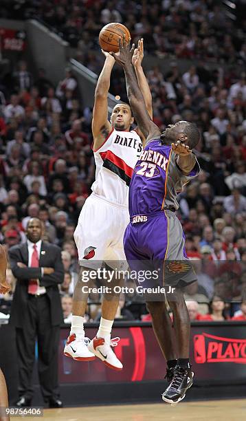 Brandon Roy of the Portland Trail Blazers shoots against Jason Richardson of the Phoenix Suns during Game Six of the Western Conference Quarterfinals...