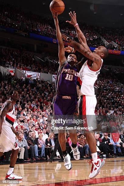 Leandro Barbosa of the Phoenix Suns goes up for a shot against Dante Cunningham of the Portland Trail Blazers in Game Six of the Western Conference...