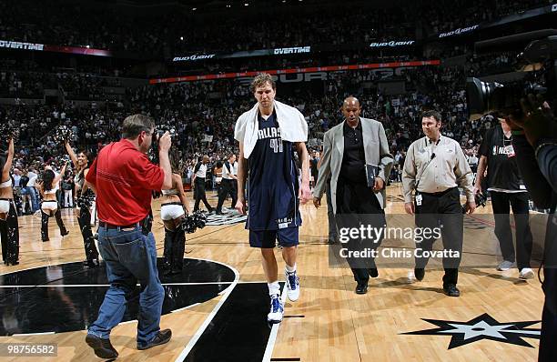 Dirk Nowitzki the Dallas Mavericks leaves the court after the Mavericks were defeated by the San Antonio Spurs in Game Six of the Western Conference...