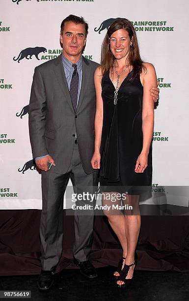 Actor Chris Noth and acting Executive Director of RAN Rebecca Tarbotton pose for a photo during the 25th anniversary party for Rainforest Action...