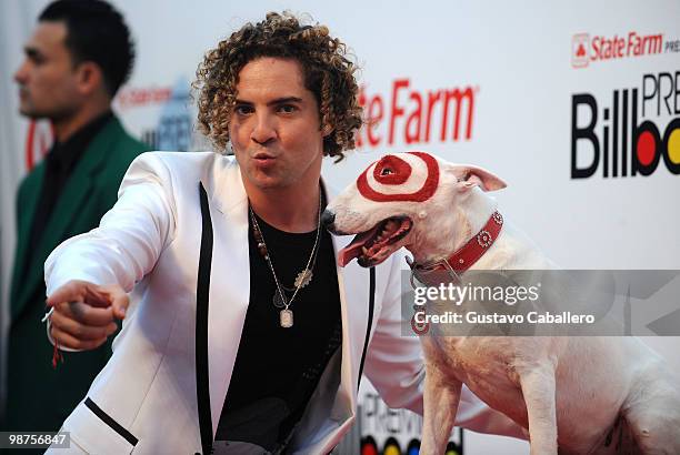 Singer David Bisbal and Bullseye the Target dog attend the 2010 Billboard Latin Music Awards at Coliseo de Puerto Rico José Miguel Agrelot on April...