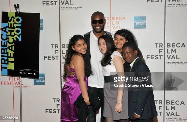 Actor / model Tyson Beckford and and Film in Motion Students attend the "Tribeca Teaches" premiere during the 9th Annual Tribeca Film Festival at the...
