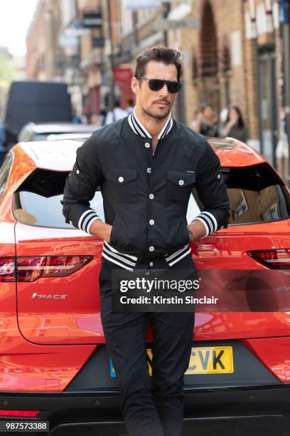 Model David Gandy wears a Dolce and Gabbana jacket during London Fashion Week Men's on June 10, 2018 in London, England.