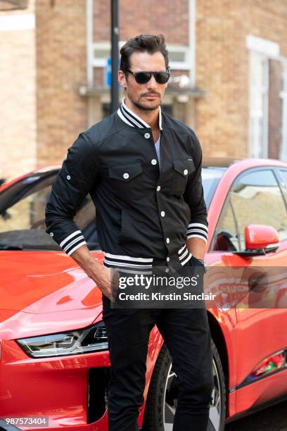 Model David Gandy wears a Dolce and Gabbana jacket during London Fashion Week Men's on June 10, 2018 in London, England.