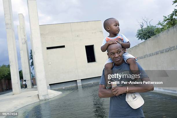 Thami Nkosi, a 29-year old activist, visits the Apartheid museum with his son on January 17 in Johannesburg, South Africa. Thami is a gender justice...