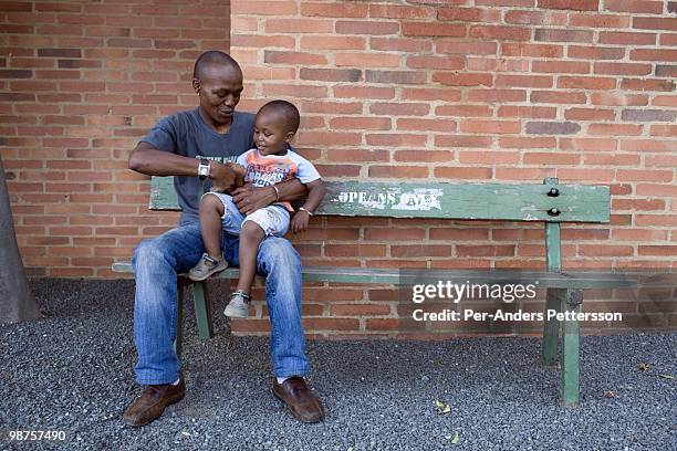 Thami Nkosi, a 29-year old activist, as the Apartheid museum with his son on January 17 in Johannesburg, South Africa. Thami is a gender justice...