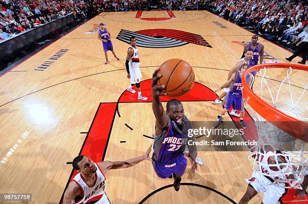 Jason Richardson of the Phoenix Suns goes up for a shot over Brandon Roy of the Portland Trail Blazers in Game Six of the Western Conference...