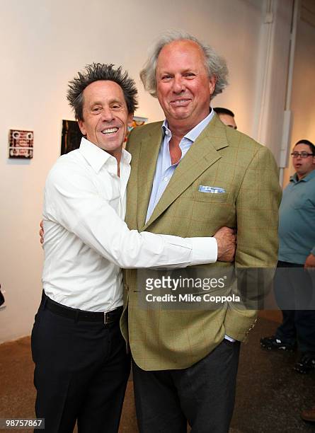Producer Brian Grazer and Editor-in-chief U.S. Vanity Fair Graydon Carter attend the art show "Theurgy" at the Elga Wimmer Gallery on April 29, 2010...