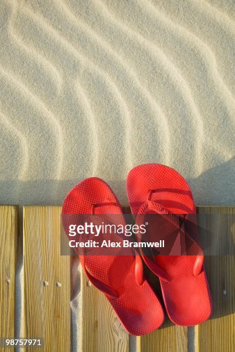 Beach Boardwalk And Red Shoes High-Res Stock Photo - Getty Images