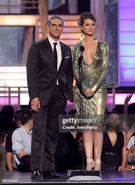 Miguel Varoni and Miss Universe 2009 Stefania Fernandez speak onstage at the 2010 Billboard Latin Music Awards at Coliseo de Puerto Rico José Miguel...