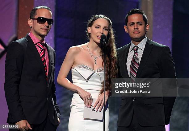 Singer Belinda and Christian Colon and Angel Rivera Guzman of Angel and Khriz speak onstage at the 2010 Billboard Latin Music Awards at Coliseo de...