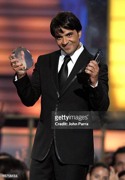 Singer Luis Fonsi accepts an award onstage at the 2010 Billboard Latin Music Awards at Coliseo de Puerto Rico José Miguel Agrelot on April 29, 2010...