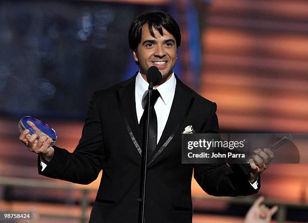 Singer Luis Fonsi accepts an award onstage at the 2010 Billboard Latin Music Awards at Coliseo de Puerto Rico José Miguel Agrelot on April 29, 2010...