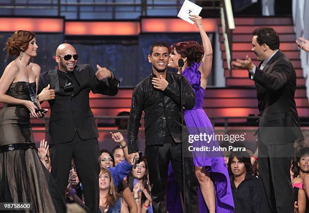 Singer Tito El Bambino accepts an award onstage at the 2010 Billboard Latin Music Awards at Coliseo de Puerto Rico José Miguel Agrelot on April 29,...