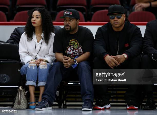 Kimberly Woodruff, league Co-Founder Ice Cube and LL Cool J watch the action during week two of the BIG3 three on three basketball league at United...