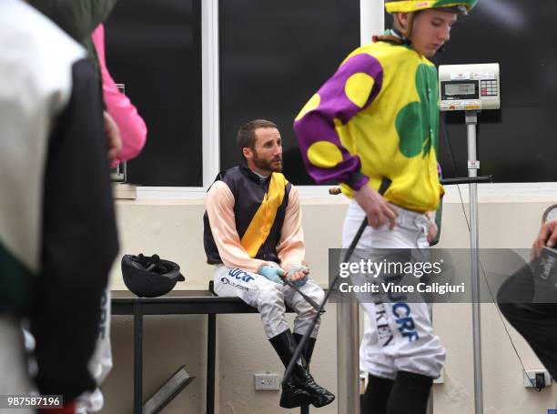 Damien Oliver is seen in the jockeys room during Melbourne racing at Caulfield Racecourse on June 30, 2018 in Melbourne, Australia.