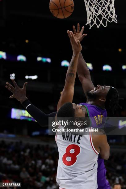 James White of Trilogy and Kwame Brown of 3 Headed Monsters battle for the rebound during week two of the BIG3 three on three basketball league at...