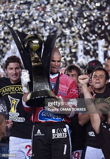 Miguel Calero, captain of Mexican Pachuca lifts the trophy of the CONCACAF Champion League tournament after beating Cruz Azul by 1-0 on April 28,...
