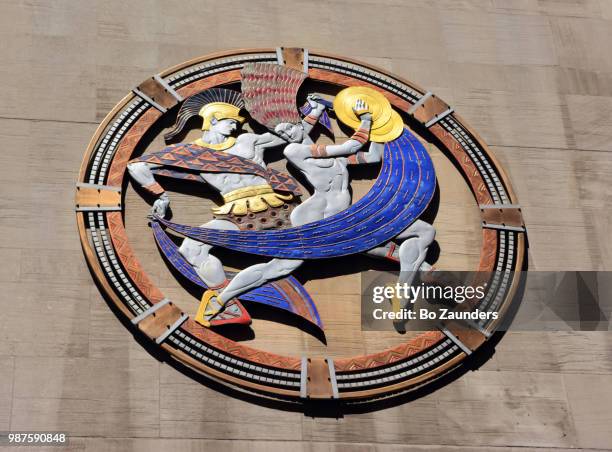 relief sculpture on radio city music hall's 50th street facade, in nyc. - roundel stock pictures, royalty-free photos & images