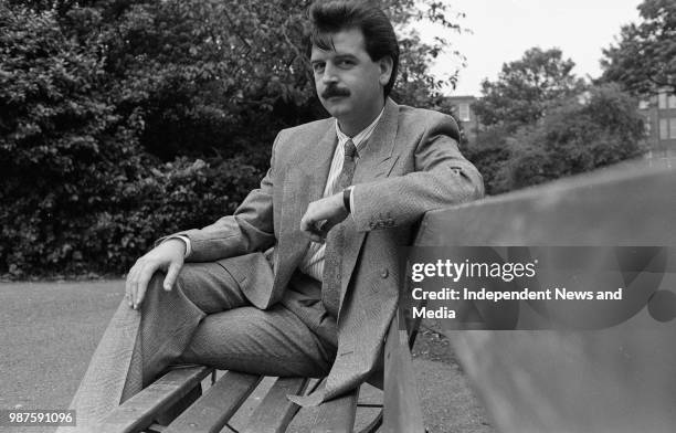 Radio presenter Marty Whelan modeling cloths from Le Tricoteur and suits from Louis Copeland, circa October 1988 . .