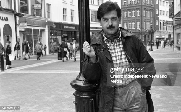 Radio presenter Marty Whelan modeling cloths from Le Tricoteur and suits from Louis Copeland, circa October 1988 . .