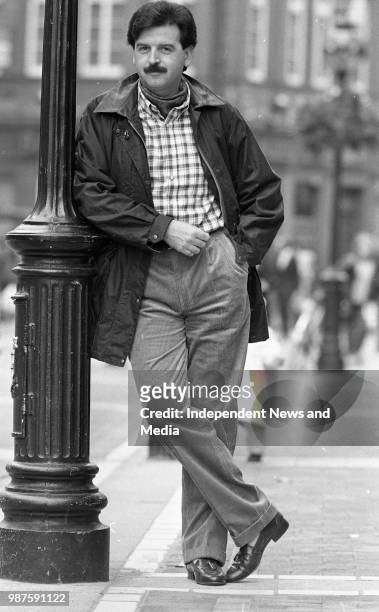 Radio presenter Marty Whelan modeling cloths from Le Tricoteur and suits from Louis Copeland, circa October 1988 . .