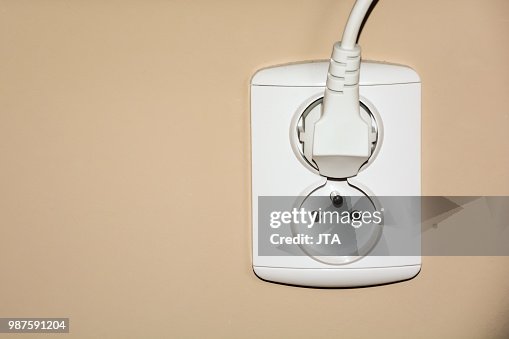 White double electrical socket with plug White double electrical socket with plug