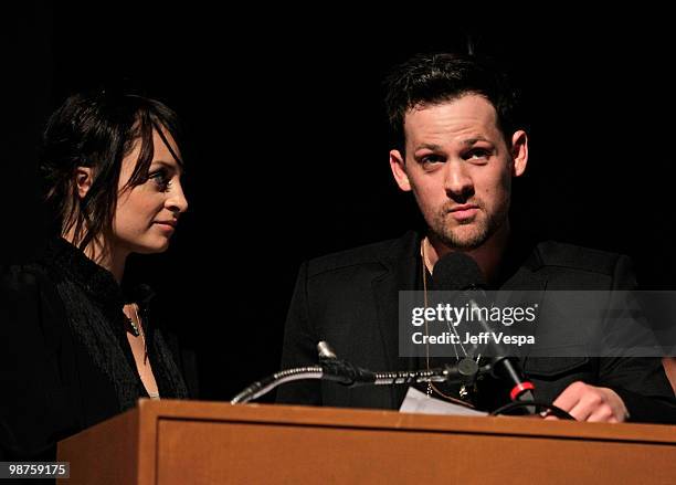 Nicole Richie and musician Joel Madden speak at the Beyond Shelter Inspiration Awards Celebration held at Paramount Studios on April 29, 2010 in Los...