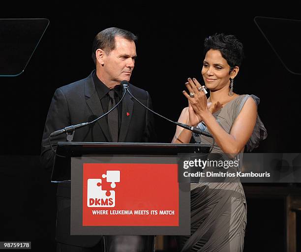 Halle Berry and CEO of Coty Inc. Bernd Beet speak at the DKMS' 4th Annual Gala: Linked Against Leukemia at Cipriani 42nd Street on April 29, 2010 in...