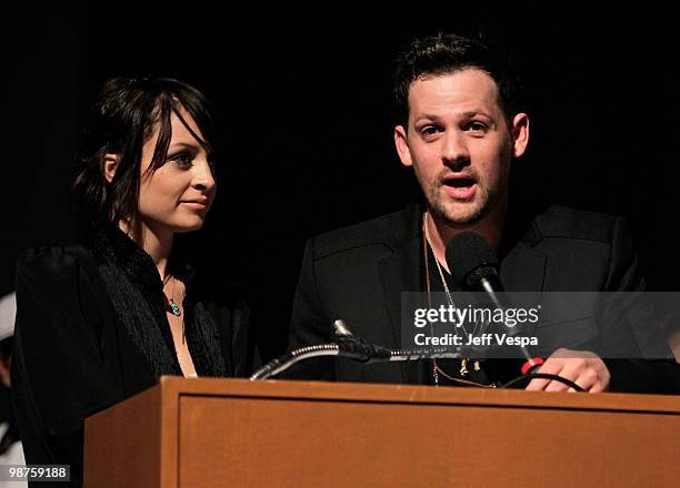 Nicole Richie and musician Joel Madden speak at the Beyond Shelter Inspiration Awards Celebration held at Paramount Studios on April 29, 2010 in Los...