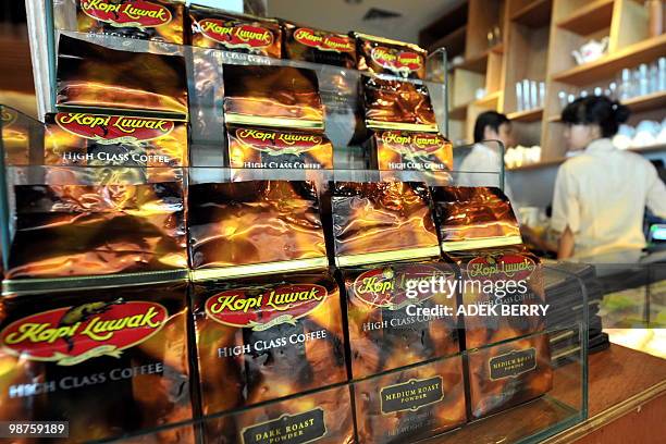 Packs of civet coffee are displayed at the 'Kopi Luwak' coffee shop in Jakarta on April 30, 2010. Kopi Luwak or Civet Coffee is made from beans of...