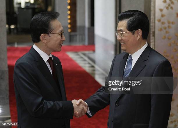 Chinese President Hu Jintao receives South Korean President Lee Myung-bak on April 30, 2010 in Shanghai, China. The Presidents held talks which...