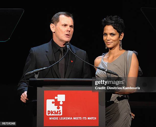 Halle Berry and CEO of Coty Inc. Bernd Beetz speak at the DKMS' 4th Annual Gala: Linked Against Leukemia at Cipriani 42nd Street on April 29, 2010 in...