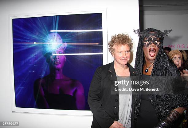 Grace Jones, Chris Levine at the private view of 'Stillness At The Speed Of Light' an exhibition of portraits by Chris Levine on April 29, 2010 in...