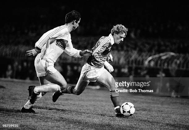 Ian Stewart of Northern Ireland is chased by Turkey defender Eren during the European Championship qualifying match held at Windsor Park, Belfast on...