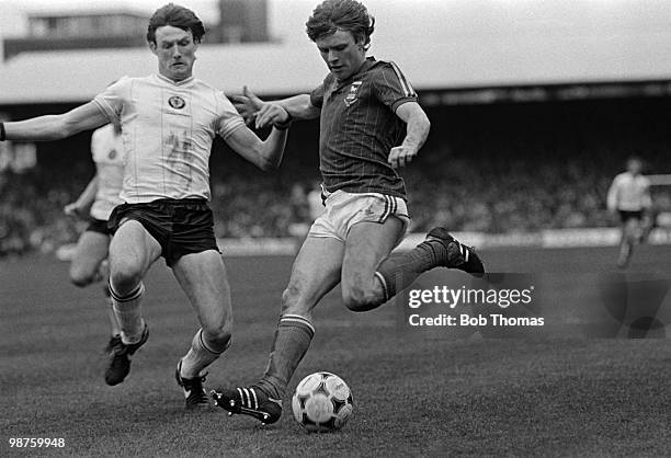 Ipswich Town winger Kevin O'Callaghan is challenged by Allan Evans of Aston Villa during the Division One football match held at Portman Road,...