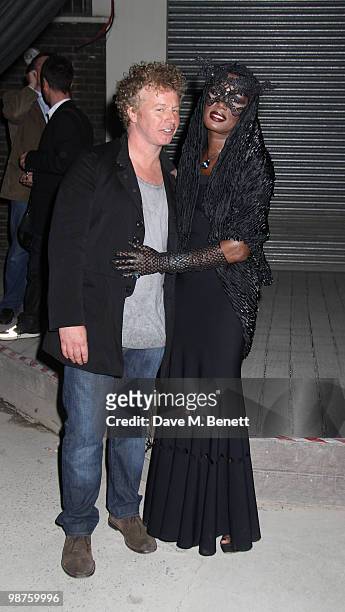 Grace Jones, Chris Levine at the private view of 'Stillness At The Speed Of Light' an exhibition of portraits by Chris Levine on April 29, 2010 in...