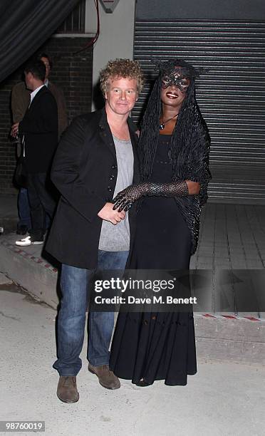 Grace Jones, Chris Levine at the private view of 'Stillness At The Speed Of Light' an exhibition of portraits by Chris Levine on April 29, 2010 in...