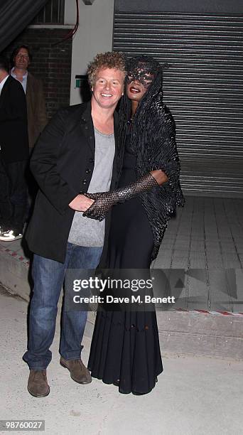 Grace Jones, Chris Levine at the private view of 'Stillness At The Speed Of Light' an exhibition of portraits by Chris Levine on April 29, 2010 in...