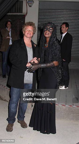 Grace Jones, Chris Levine at the private view of 'Stillness At The Speed Of Light' an exhibition of portraits by Chris Levine on April 29, 2010 in...