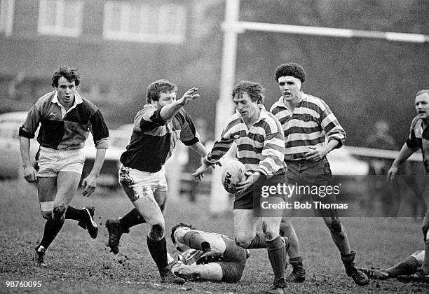 Steve Smith, Sale scrum-half, kicks for touch as Harlequins' prop Mickey Claxton prepares to charge down during the Rugby Union John Player Cup 4th...