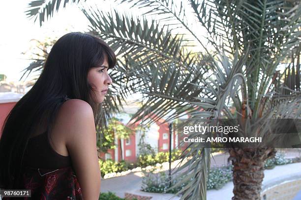 Egyptian actress Yasmin Abdelaziz poses for a picture on the first day of shooting of her new film Sibuni Fi Hali in Badrashin, 45kms south of Cairo,...