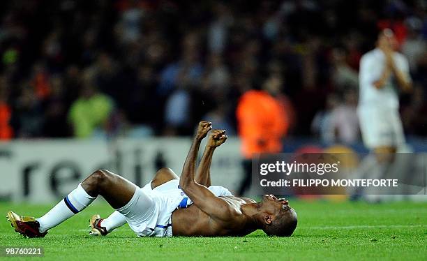 Inter Milan's Cameroonian forward Samuel Eto'o jubilates after the UEFA Champions League semi-final second leg football match Barcelona vs Inter...