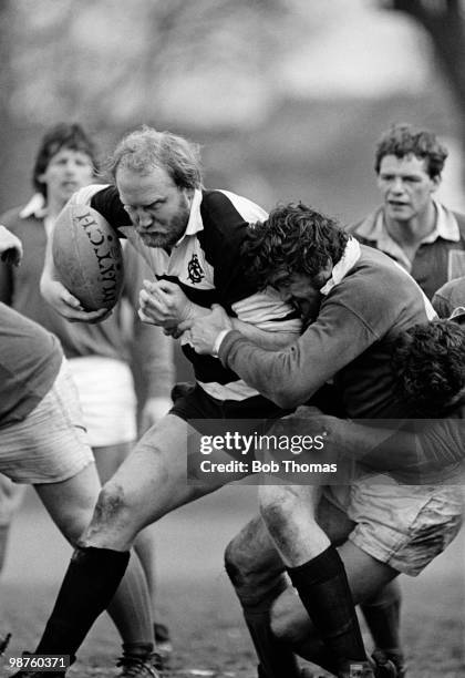 Jim Syddall of Barbarians is tackled by Vince Canon of East Midlands during the Mobbs Memorial Rugby match held at Franklin's Gardens, Northampton on...