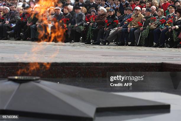 Russian WWII veteran attend a ceremony to light the "Eternal Flame of Memory and Glory" at Victory Park in Moscow on April 30, 2010. In the run up to...