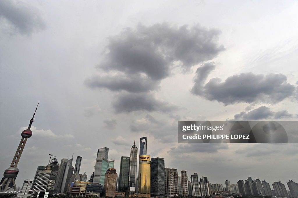 Clouds build up over the city skyline in