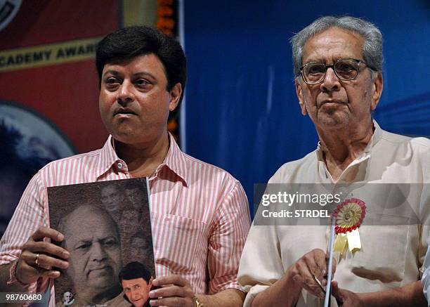Indian actors Shreeram Lagoo and Sachin Pilgaonkar take part in a ceremony in Mumbai on April 30 held to commemerate the birth anniversary of Indian...