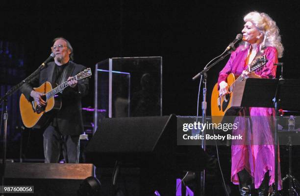 Stephen Stills and Judy Collins perform together at St George Theatre on June 29, 2018 in New York City.