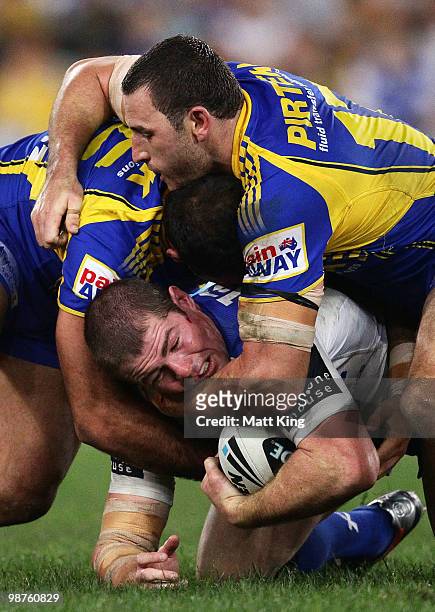 Andrew Ryan of the Bulldogs is tackled during the round eight NRL match between the Parramatta Eels and the Canterbury-Bankstown Bulldogs at ANZ...